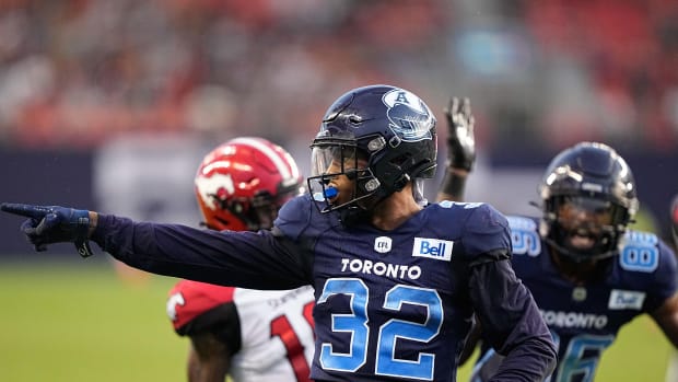 Aug 20, 2022; Toronto, Ontario, CAN; Toronto Argonauts running back Javon Leake (32) against the Calgary Stampeders at BMO Field. Mandatory Credit: John E. Sokolowski-USA TODAY Sports  